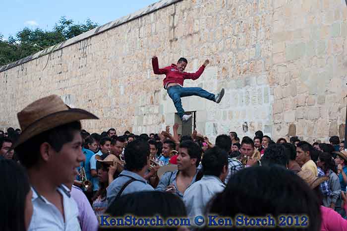 Boy Being Bounced by the Crowd